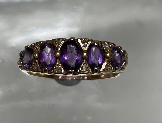 Mid 20th Century Amethyst Five Stone Bridge Ring